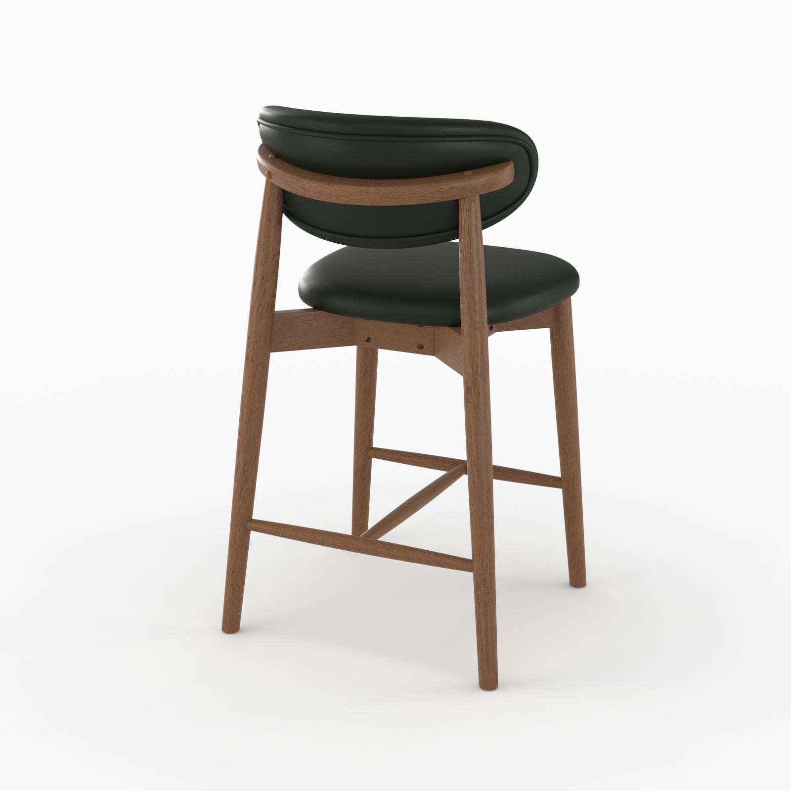 Chaise pour ilot central Yuna en cuir synthétique noir et bois foncé, vue de trois quarts arrière - Maison Pavane