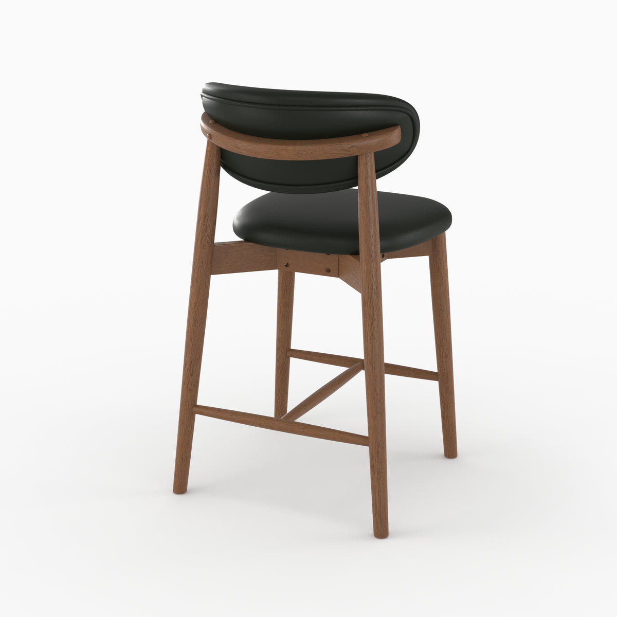 Chaise pour ilot central Yuna en cuir synthétique noir et bois foncé, vue de trois quarts arrière - Maison Pavane