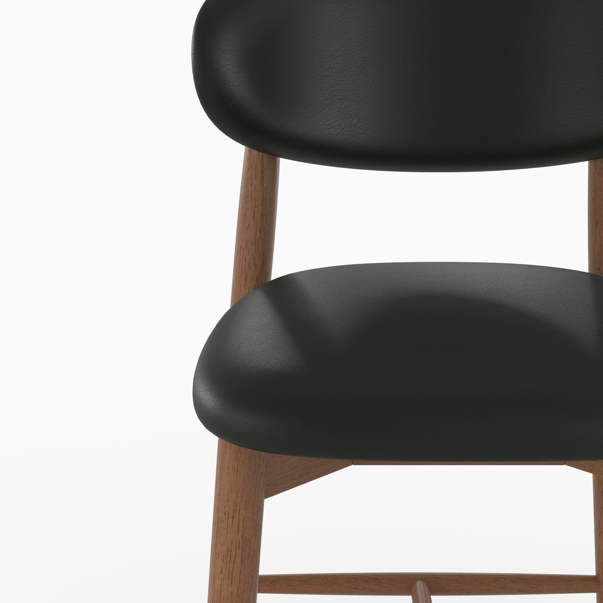 Chaise pour ilot central Yuna en cuir synthétique noir, zoom sur l'assise et le dossier - Maison Pavane