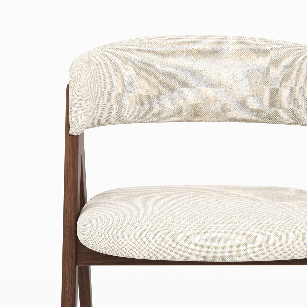 Détail de l'assise et du dossier en tissu beige de la chaise Isis - Maison Pavane