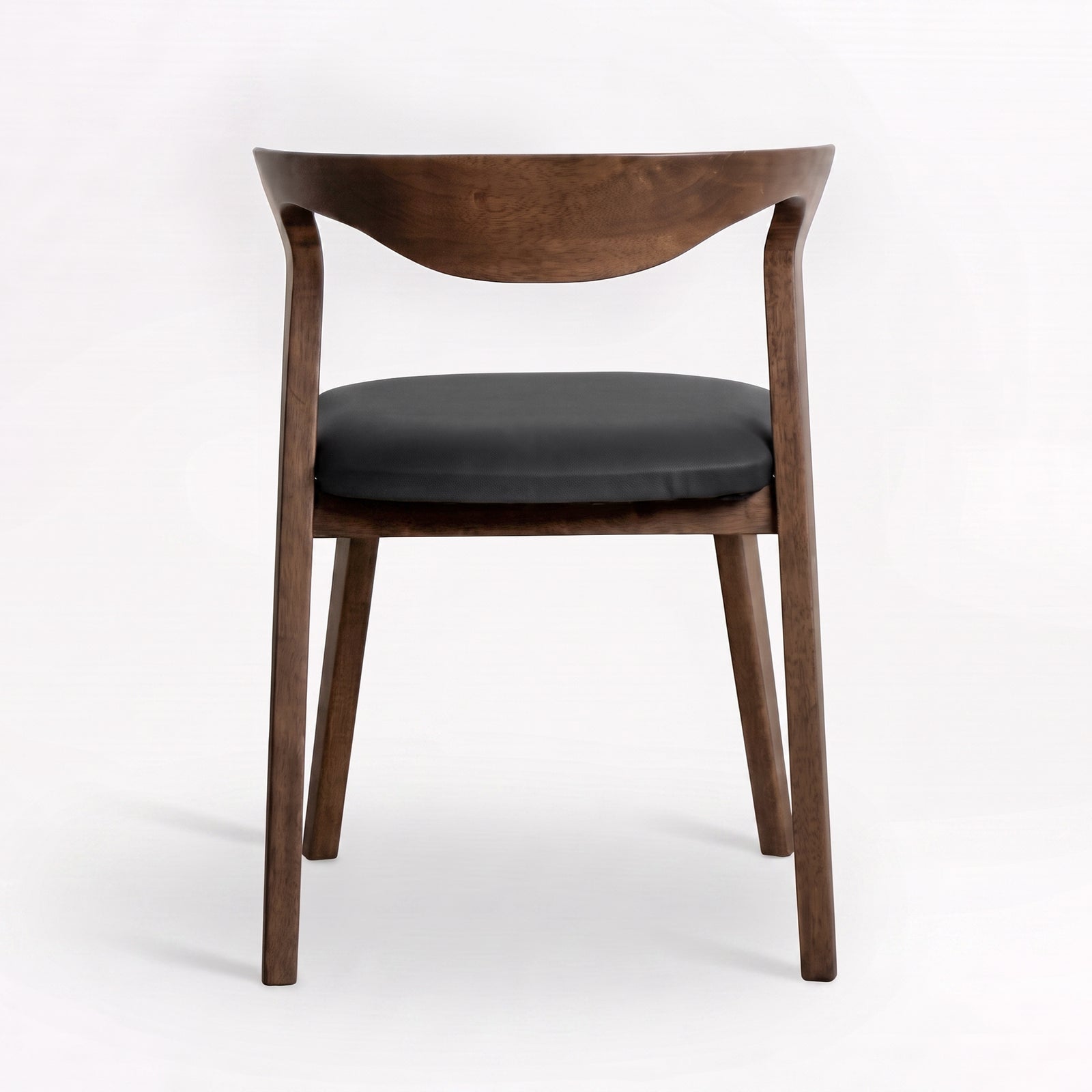 Chaise Vega en bois d'hévéa marron et cuir synthétique noir, vue de dos - Maison Pavane