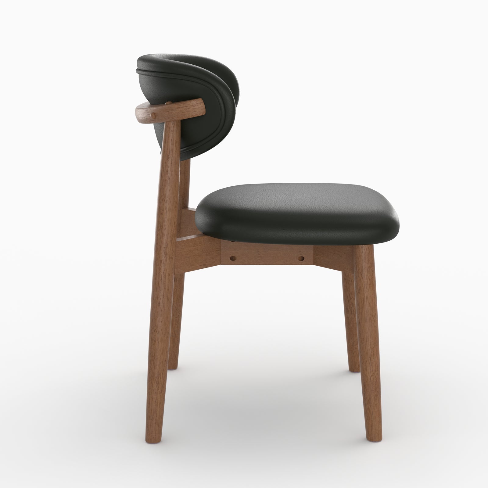 Chaise Yuna en cuir synthétique noir et bois foncé, vue de profil - Maison Pavane