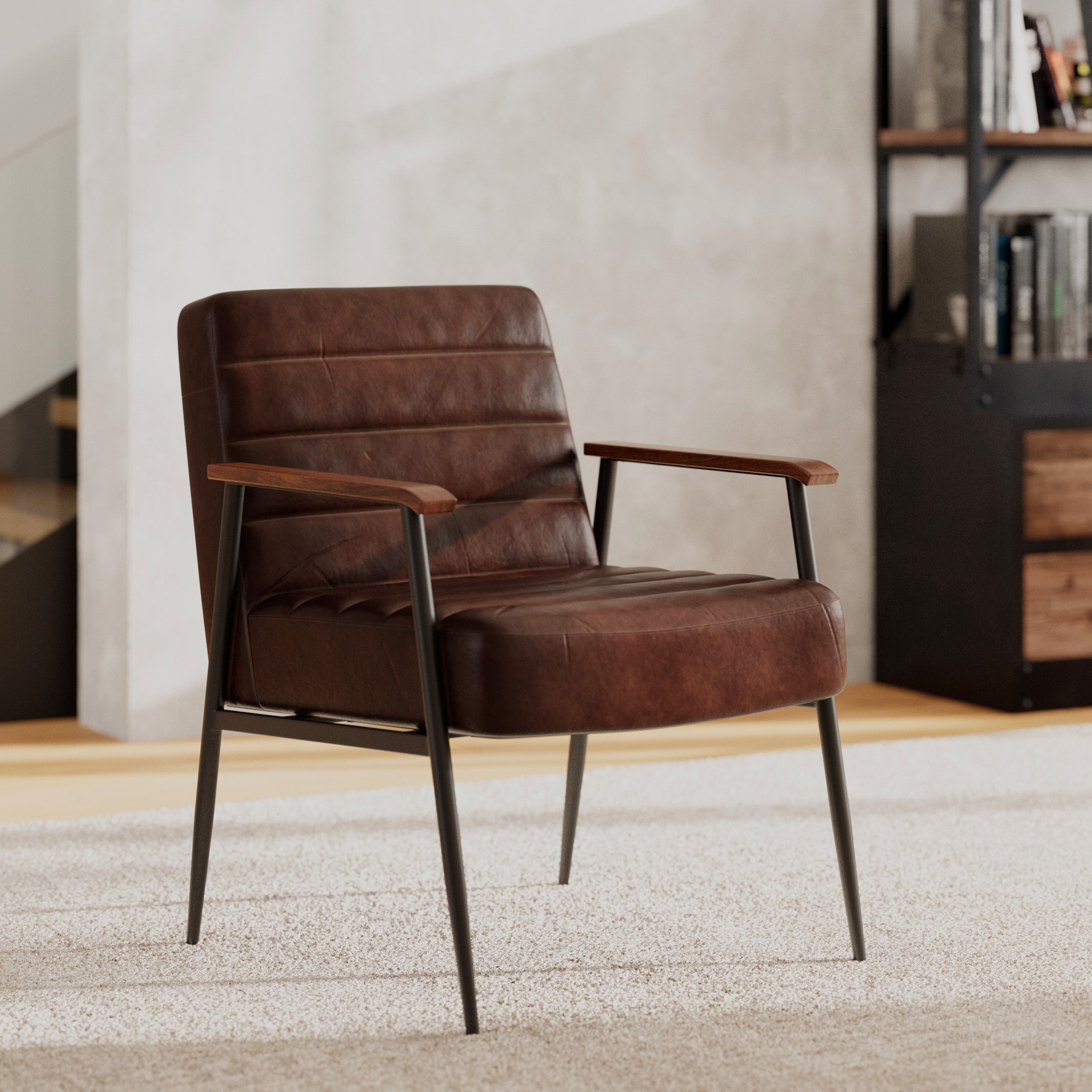 fauteuil en cuir accoudoirs hugues pieds noirs metal