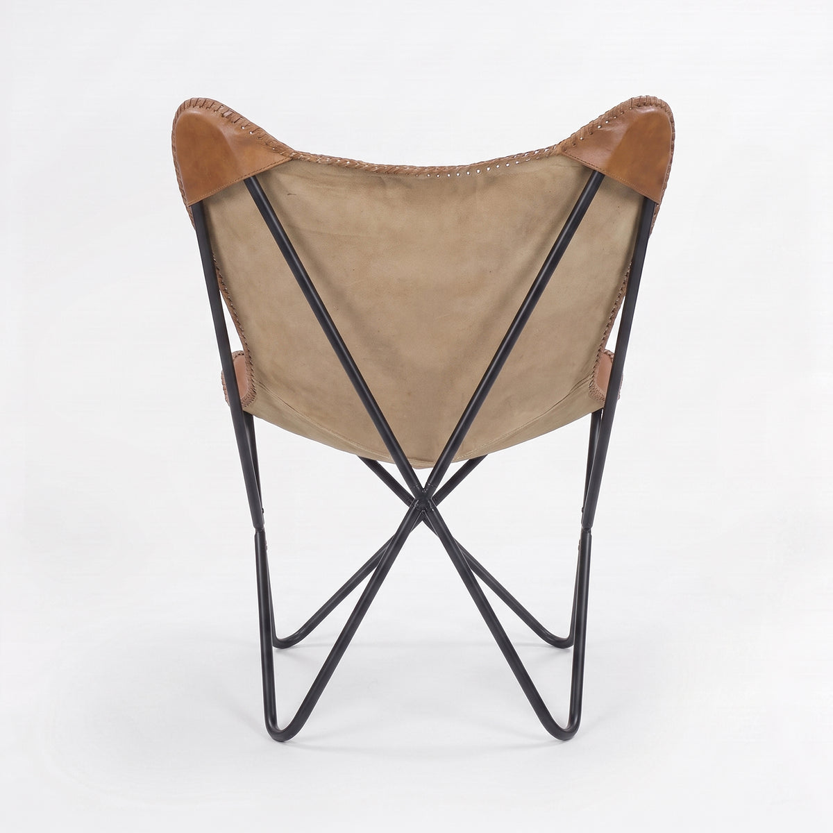 Fauteuil papillon Octave en cuir de buffle marron, vue de dos - Maison Pavane