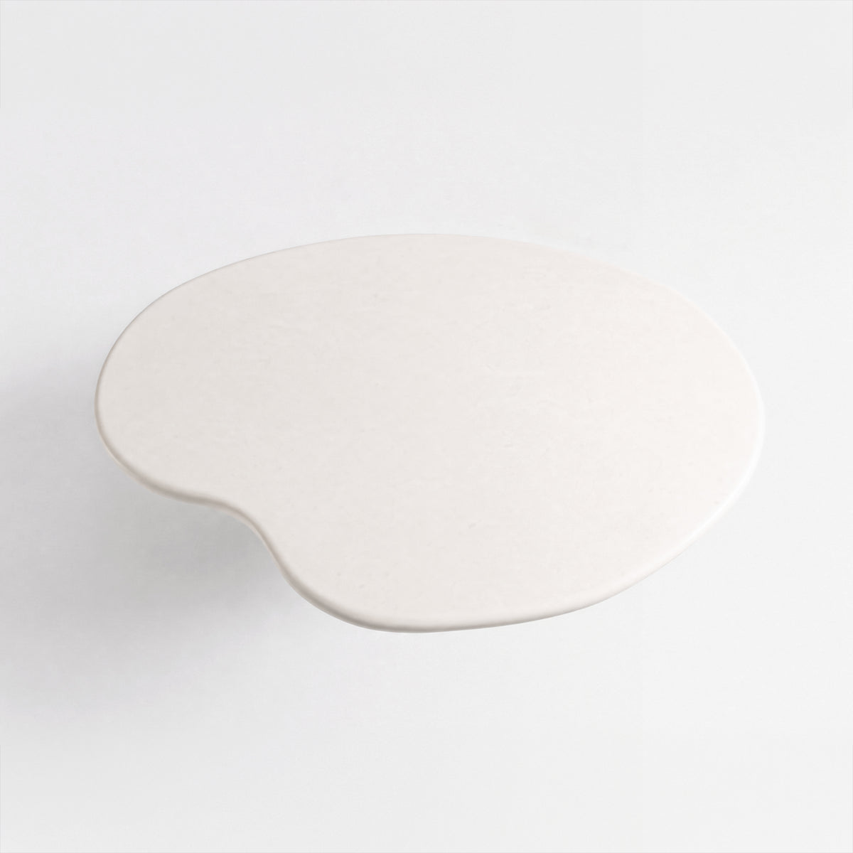 Table basse organique Anafi en fibre d'argile effet béton écrue, vue de dessus - Maison Pavane