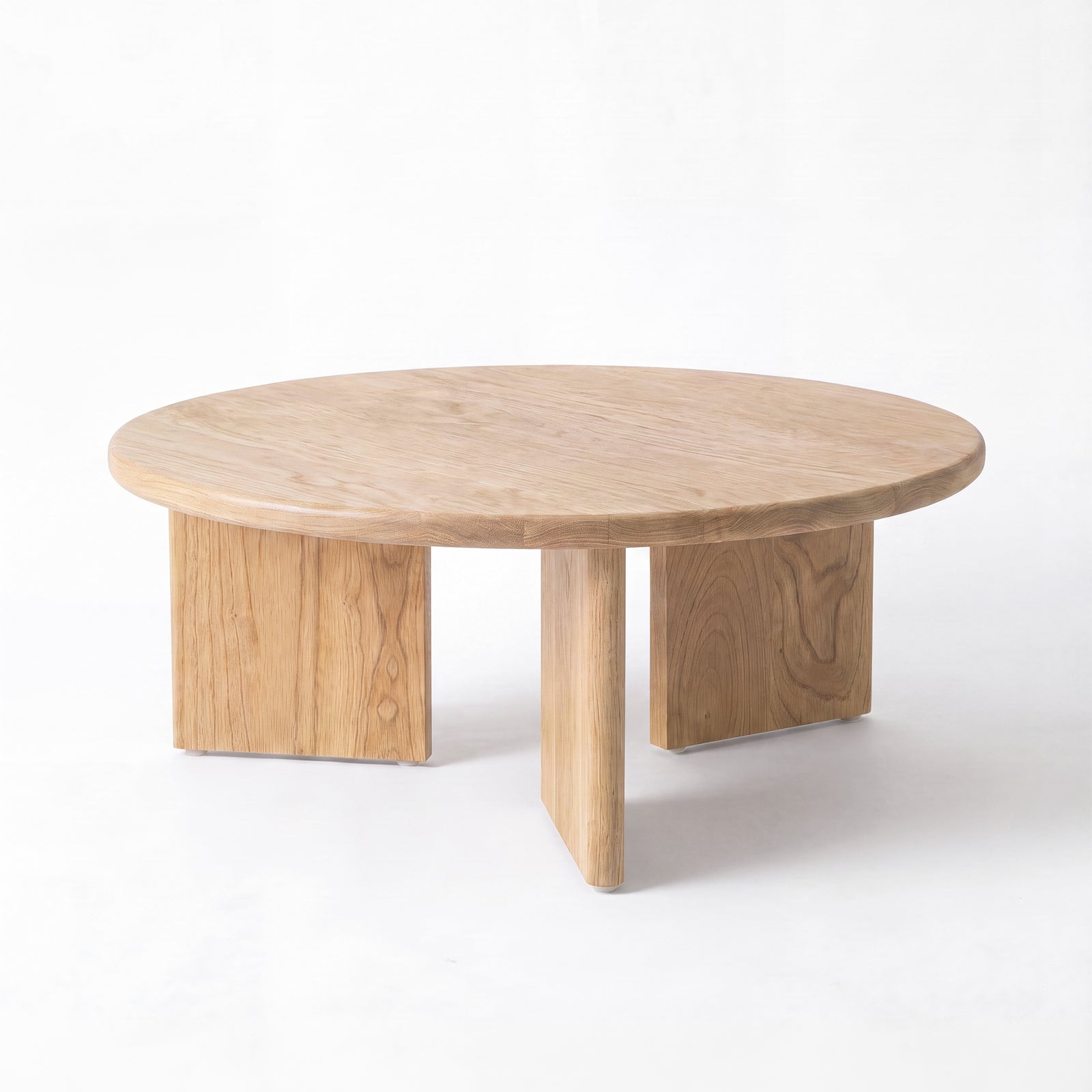 Table basse ronde Galia bois massif mindi naturel trois quarts – Maison Pavane