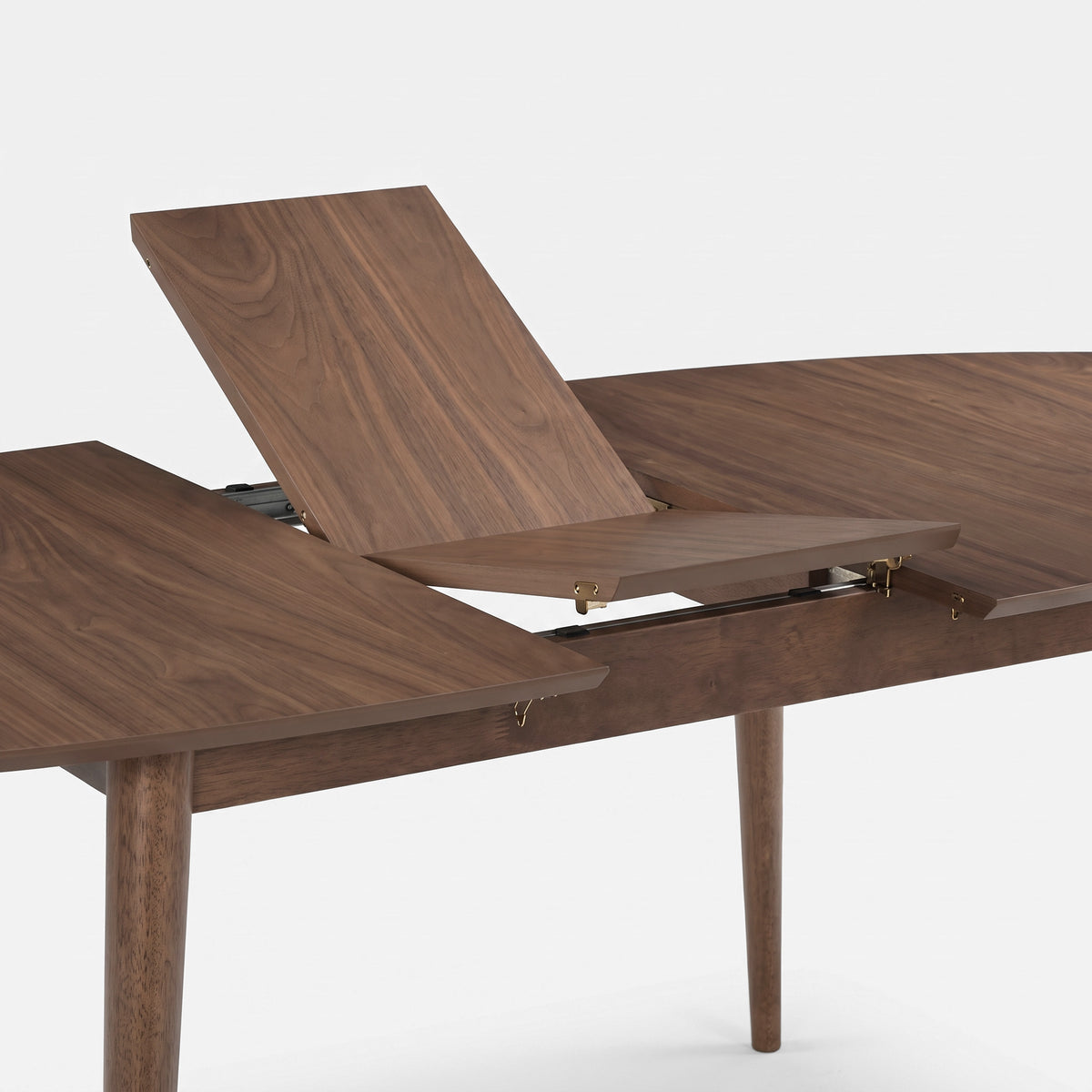 Détail de l'allonge de la table ovale Eddy extensible en bois foncé - Maison Pavane