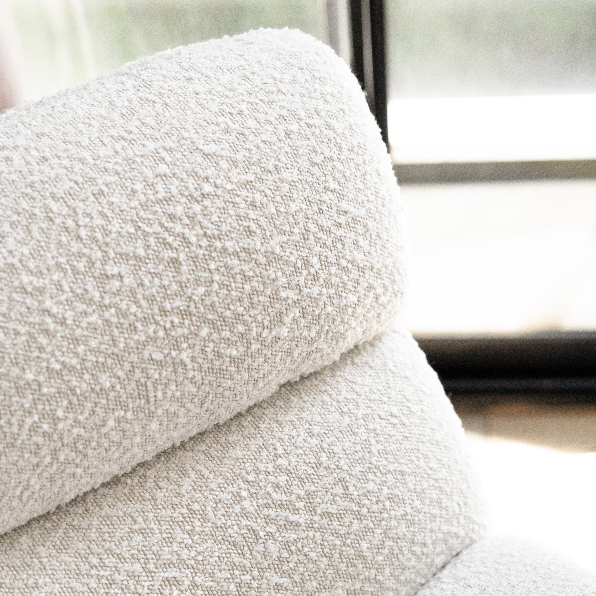 Sillón Teddy de tela bouclé blanca